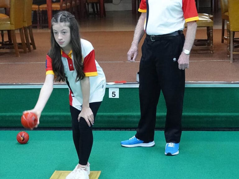 Our youngest junior member receiving some coaching tips from granddad at Kingsthorpe indoor bowling club